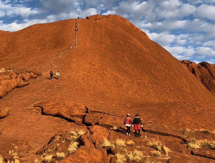 Walkers descending Uluru. The climb was banned in October this year. 